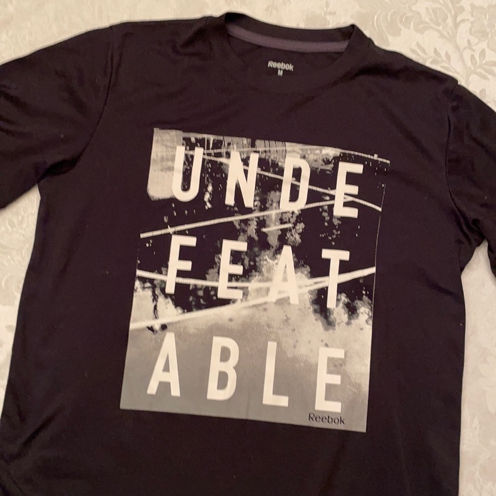 Reebok t shirt boys size M 10-12 “Undefeatable”